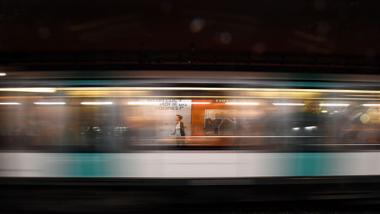 time lapse photography of woman riding train thumbnail