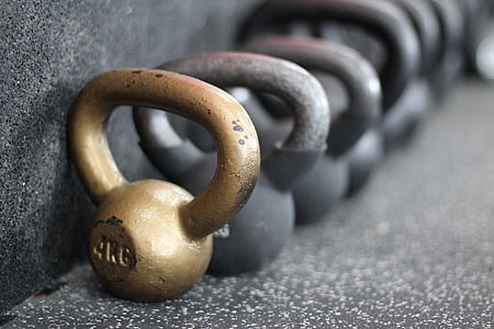 yellow steel kettle bell thumbnail