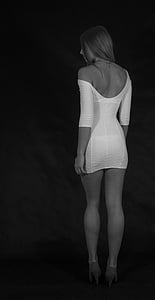 grayscale photography of woman in backless bodycon dress thumbnail