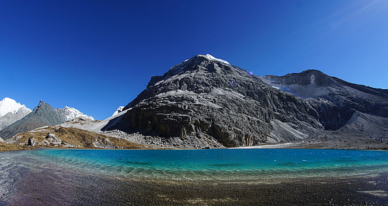 blue body of water under sunny sky thumbnail