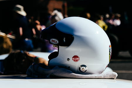 white Bell helmet on white textile thumbnail