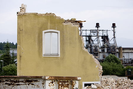 photo of wrecked beige house thumbnail
