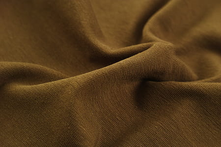 Close-Up Photo of Brown Textile thumbnail