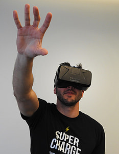man using VR google near wall thumbnail