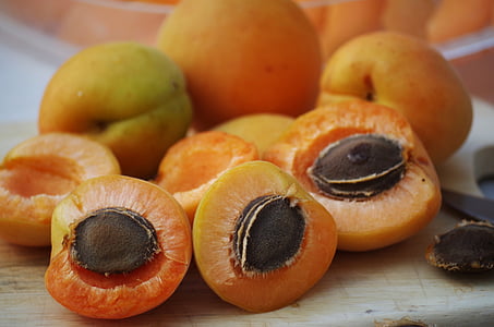 bunch of orange fruits closeup photo thumbnail