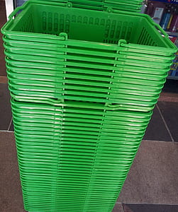 pile of green plastic shopping cart thumbnail