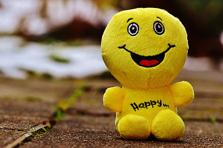 macro photo of yellow emoji plush toy thumbnail