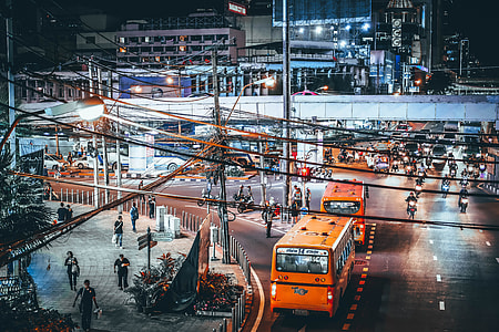 two orange buses thumbnail