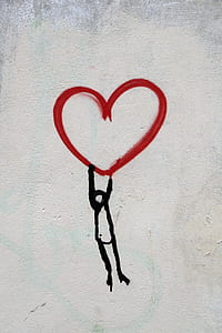 person holding heart sketch thumbnail
