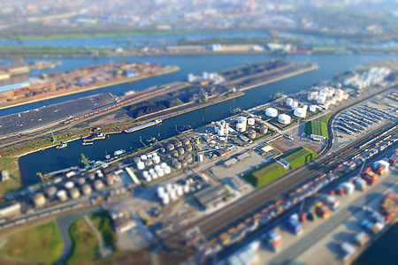 aerial photography of concrete buildings near body of water thumbnail