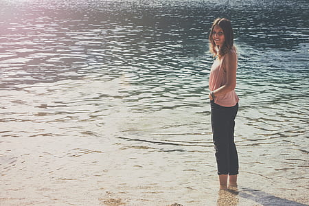 woman standing in body of water thumbnail