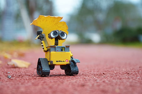 selective focus photography of Wall E on ground thumbnail
