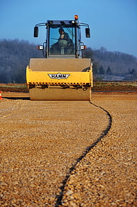 person riding Hamm road roller thumbnail