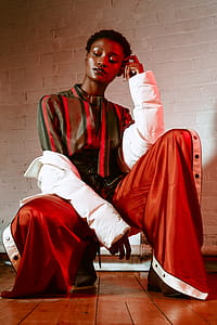 Model In Warm Light Posing Photo thumbnail