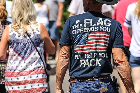 Guy wearing a shirt that says If this flag offends you I ll help you pack. thumbnail
