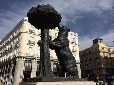 black bear statue in front of building thumbnail