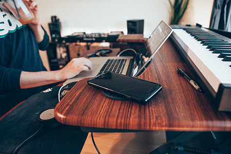 person using laptop indoors thumbnail