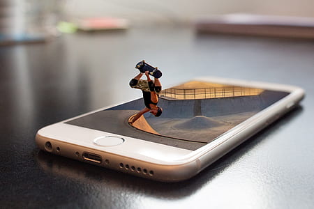 person skateboarding on silver iPhone 6 graphic illustration thumbnail