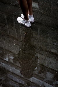 woman standing on shallow water thumbnail