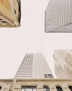 low angle photography of skyscrapers thumbnail