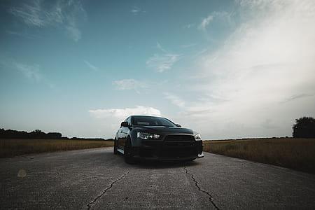 black Mitsubishi Lancer sedan thumbnail