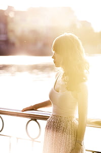 woman wearing white spaghetti strap dress thumbnail