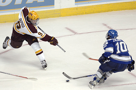two men playing ice hockey thumbnail