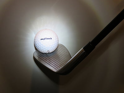 white golf ball and golf club thumbnail