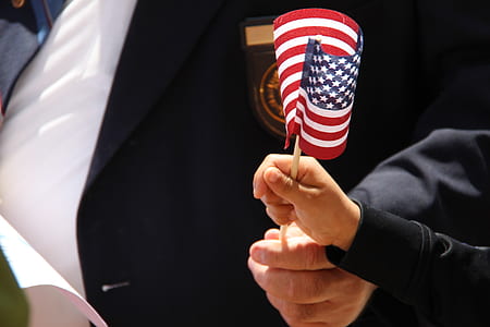 person holding American flaglet thumbnail