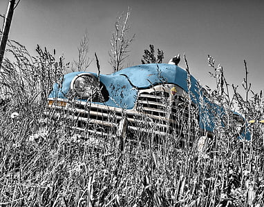 selective color photography of classic blue car thumbnail