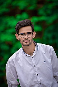 Person Wearing White Button-up Top thumbnail