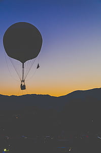 hot-air balloon on top of mountain thumbnail