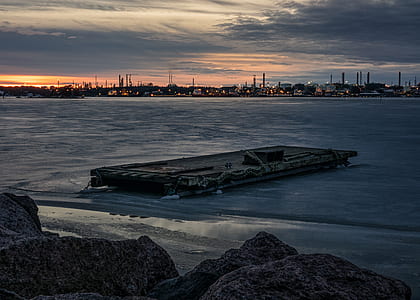 brown wooden dock on body of water thumbnail