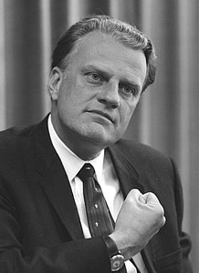 grayscale photo of man wearing blazer thumbnail