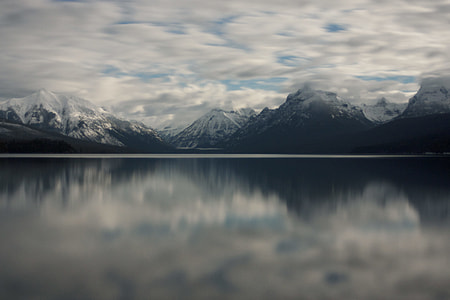 snow-covered mountains during cloudy day thumbnail