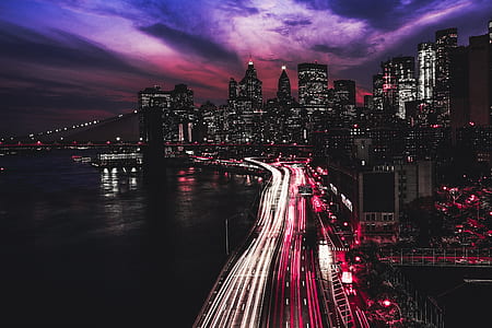 timelapse photography of busy street with lighted buildings thumbnail