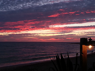 body of water during sunset thumbnail
