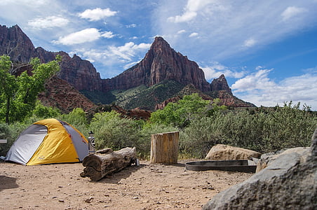 yellow and gray dome tent with mountain view during daytime thumbnail