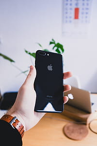 person holding jet black iPhone 7 Plus thumbnail