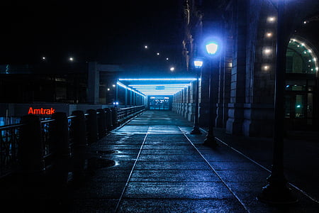 two black lamp posts beside of road thumbnail