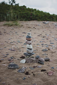 Stack of Stones on the Middle of Brown Soil thumbnail