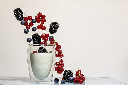assorted berries in clear drinking glass thumbnail