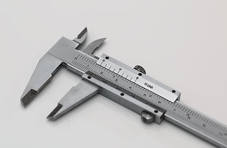 silver caliper on white surface thumbnail