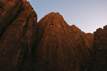 low angle photography of cliff at daytime thumbnail