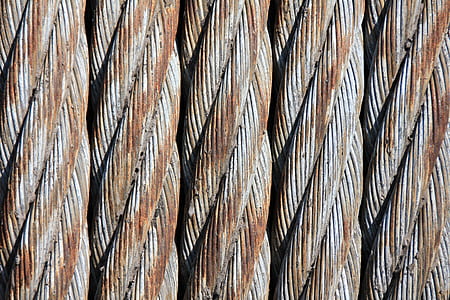 close-up photography of brown and gray rusty cables thumbnail