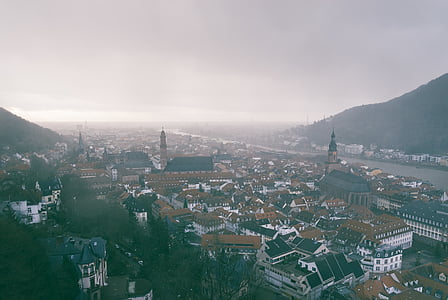 aerial photo of church and houses during daytime thumbnail