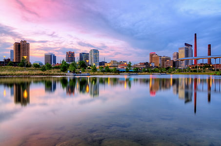high-rise building near body of water thumbnail