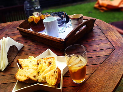 clear drinking glass on brown wooden tray thumbnail