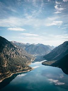 River in the Middle of Mountains during Day thumbnail