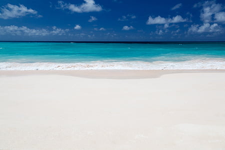 white sand beach and blue water thumbnail